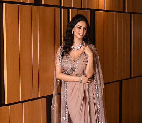 Sneha Bose in a drape sari by Rishi & Soujit