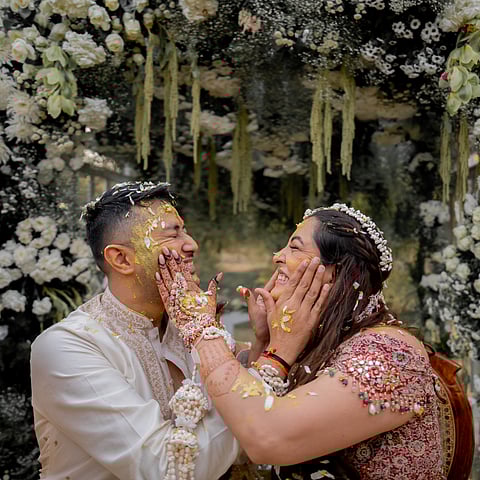 Sakshi Sindhwani and Raghav with white floral jewellery by Floral Art for their Haldi ceremony