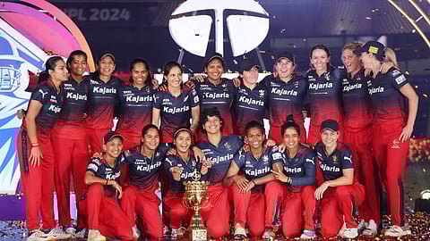 The RCB Womens team with the WPL Trophy 2024