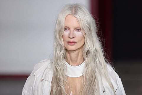 In frame: Kristen McMenamy wears a creation as part of the Vivienne Westwood Fall/Winter