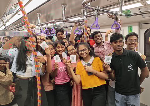 Happy faces on the metro