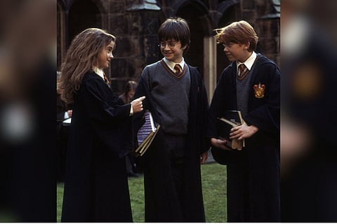 Daniel Radcliffe as Harry Potter, Emma Watson as Hermione Granger and Rupert Grint as Ron Weasly in the Harry Potter film series