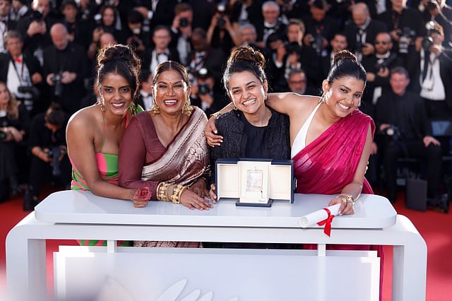 Actor Divya Prabha with the team of All We Imagine as Light at Cannes