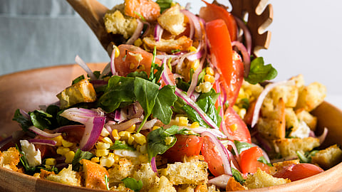 Tomato, arugula and bread salad with fresh corn and mozzarella