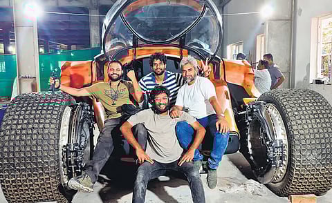 Members from the production team with Bujji