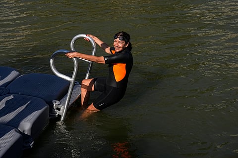 Paris Mayor Anne Hidalgo enters the Seine river in Paris (July 17)