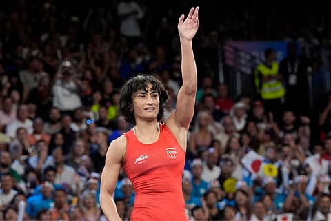 Vinesh Phogat celebrates after defeating Cuba's Yusneylys Guzman during their women's freestyle 50kg wrestling semifinal match, at Champ-de-Mars Arena, during the 2024 Summer Olympics (Aug. 6) in Paris, France