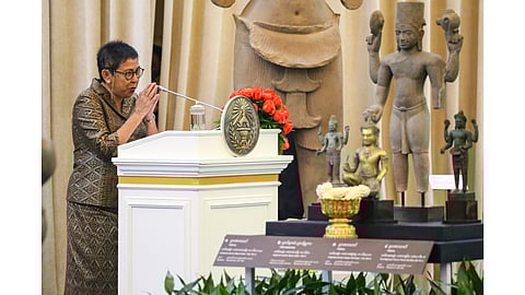 Cambodian Minister of Culture and Fine Arts Phoeurng Sackona greets before delivering a speech during a ceremony for the return of artifacts at Peace Palace in Phnom Penh, Cambodia (Aug. 22, 2024)