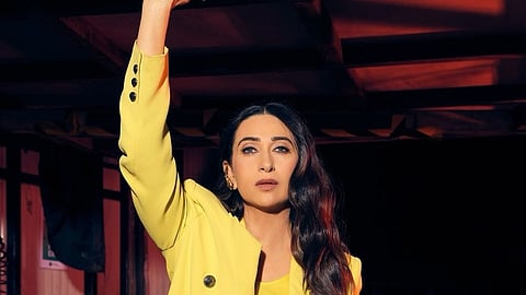 Suit up like Karisma Kapoor did in a stunning pantsuit set