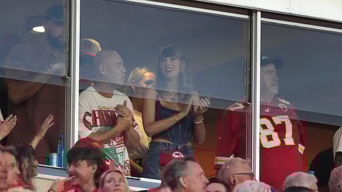 Taylor Swift is seen in a suite before the start of an NFL football game between the Kansas City Chiefs and the Baltimore Ravens