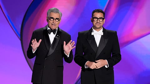 Hosts Eugene Levy, left, and Dan Levy speak during the 76th Primetime Emmy Awards