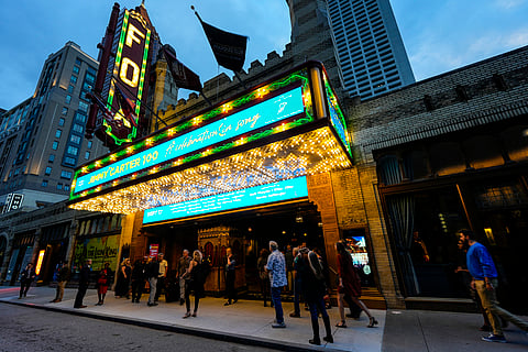 People wait in line ahead of a 'Jimmy Carter 100: A Celebration in Song' concert at the Fox Theatre on Sept. 17, 2024, in Atlanta