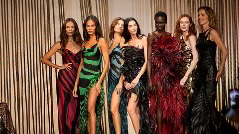 Models Joan Smalls, Isabeli Fontana, Natasha Poly, Maria Carla Boscono, Alex Wek, Karen Elson and Eva Herzigova with with Roberto Cavalli's former wife Eva Maria Duringer, wear creations as part of the Roberto Cavalli Spring Summer 2025 collection that was presented in Milan, Italy on Sept. 18, 2024