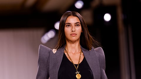 A model wears a creation as part of the Balmain Spring/Summer 2025 collection