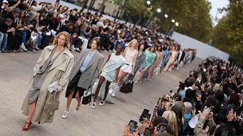 Models wear a creation as part of the Stella McCartney Spring/Summer 2025 collection