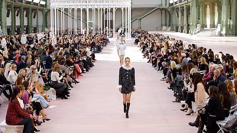 Models wear creations as part of the Chanel Spring/Summer 2025 collection