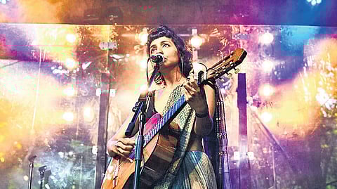 Aditi Veena aka Ditty performing at a concert