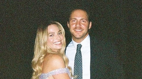 Margot Robbie and Tom Ackerley