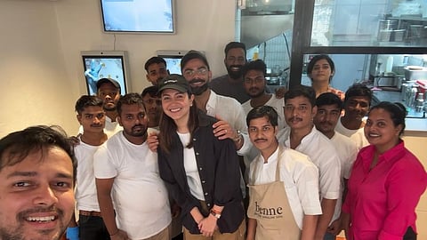 Anushka and Virat with the cafe members