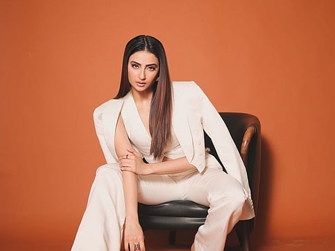 Suit up like Palak Tiwari does in an ivory pantsuit set