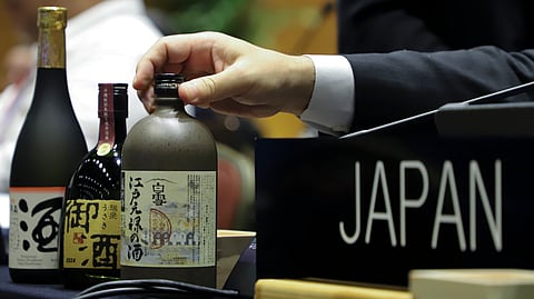 Japanese sake, that is listed as a nominee for Intangible Cultural Heritage, are displayed on Japan's delegation table, during an UNESCO World Heritage Convention