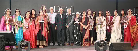 (From left) Devi Awardees, Vimor co-founder Pavithra Muddaya; Professor and dean (research), National Centre for Biological Science, Dr Vatsala Thirumalai; classical dancer Nirupama Rajendra; TNIE CEO Laxmi Menon; Mitti Café founder and CEO Alina Alam; two-time Olympian Anju Bobby George; TNIE chairman Manoj Kumar Sonthalia; former Infosys CEO SD Shibulal; TNIE editorial director Prabhu Chawla; NIMHANS director Dr Pratima Murthy; TNIE editor Santwana Bhattacharya; Science Gallery Bengaluru founding director Jahnavi Phalkey; director of Events Xpress, Neha Sonthalia Periwal; founder and managing trustee of Neev Schools, Kavitha Gupta Sabharwal; restaurateur Sonali Sattar; author Samhita Arni; and founder and managing trustee of Sanket Trust, Arundhati Nag, pose with their awards at the 29th edition of the Devi Awards in Bengaluru on November 30. Meanwhile, Kalyani collected the award on behalf of Portea Medical co-founder and chairperson Meena Ganesh.