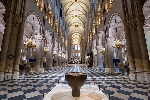 The baptistery designed by French artist and designer Guillaume Bardet is pictured as French President Emmanuel Macron visits the restored interiors of the Notre-Dame de Paris cathedral, Friday, Nov. 29, 2024 in Paris. (Christophe Petit Tesson/Pool via AP, File)