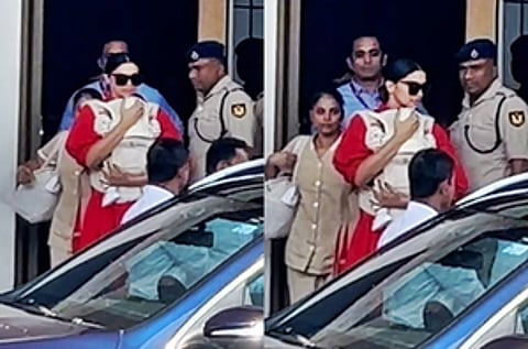 Deepika Padukone holds onto baby Dua as she exits Mumbai airport