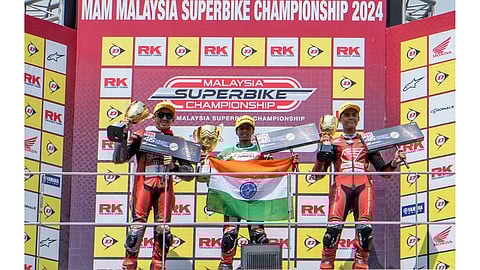 KR Kabilesh (centre) on the podium at Sepang International Circuit