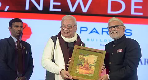 TNIE Editorial Director Prabhu Chawla (right) presents a memento to chief guest and Kerala Governor Arif Mohammed Khan