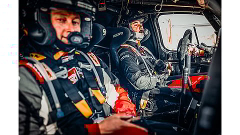 Co-driver Brett Cummings (L) and Henk Lategan