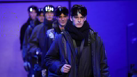 Models wear creations part of the men's Giorgio Armani Fall-Winter 2025-2026 collection, that was presented in Milan