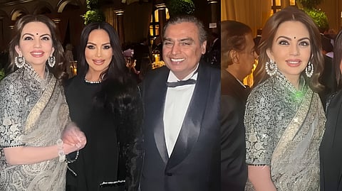 Nita Ambani, a guest at the dinner and Mukesh Ambani (L to R)