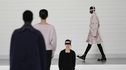 A model wears a creation as part of the men's Dior Homme Fall-Winter 2025-2026 collection, that was presented in Paris