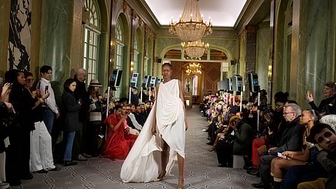 A model wears a creation as part of the Imane Ayissi Haute Couture Spring Summer 2025 collection, that was presented in Paris