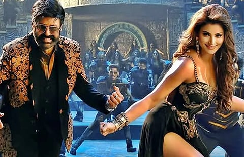 Nandamuri Balakrishna and Urvashi Rautela in a still from Daaku Maharaaj
