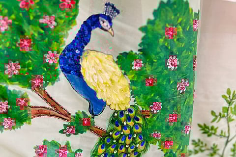 Glimpse of a hand-painted saree in Label Devina