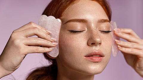 Gua sha can be essential in de-puffing your face
