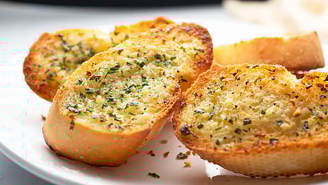 Here are two reasons why garlic bread taste better in restaurants