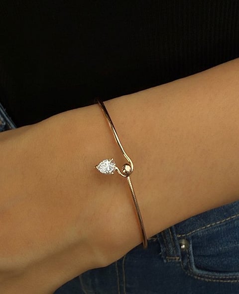 This bijouterie collection showcases the beauty of sculpted gold