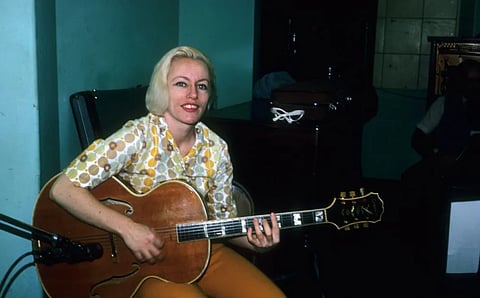 Bassist Carol Kaye plays an Epiphone hollowbody electric guitar in April 1966 in Los Angeles