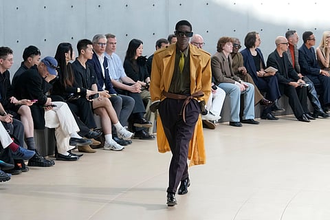 A model wears a creation as part of the men's Saint Laurent Spring-Summer 2026 collection, that was presented in Paris, Tuesday, June 24, 2025