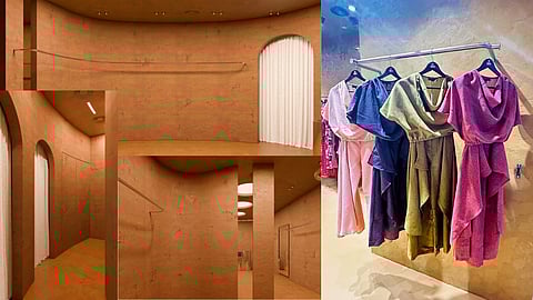 Minimalist sculptural fashion store interior with earthy tones, curated displays, and natural light in New Delhi