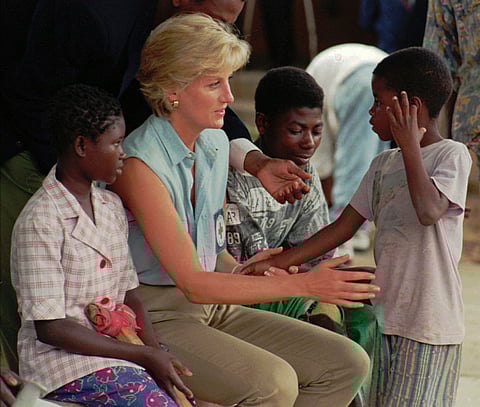 Diana, Princess of Wales, talks to young Angolan amputees
