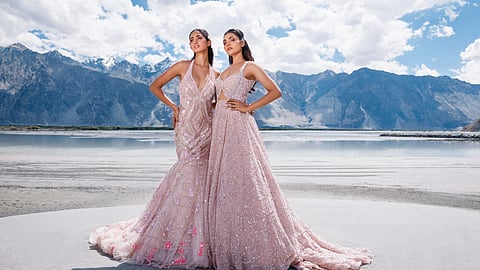 Models wearing sculptural couture gowns from Bhawna Rao’s latest collection