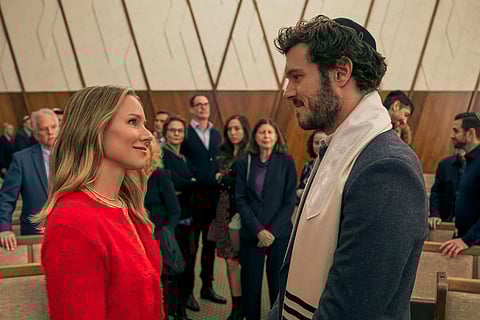 This image released by Netflix shows Kristen Bell, left, and Adam Brody in a scene from Emmy-nominated series Nobody Wants This