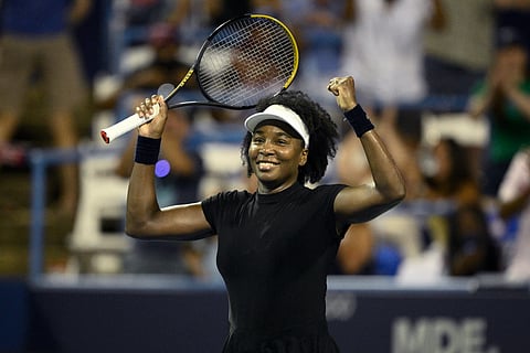 Venus Williams celebrates her win over Peyton Stearns during a match at the Citi Open tennis tournament