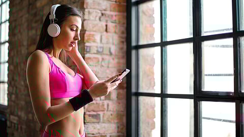 How music can trick your brain into less fatigue during exercise