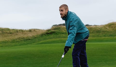 Justin Bieber playing golf in Scotland