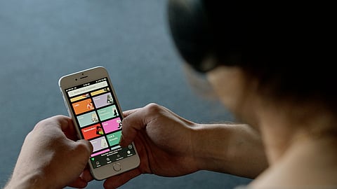 Premium members of Spotify can now text the app's AI, DJ in both English and Spanish for song requests